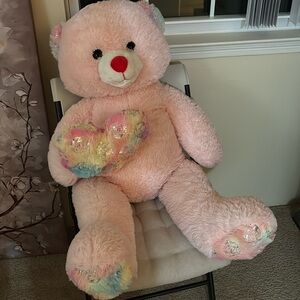 Pink bear with heart